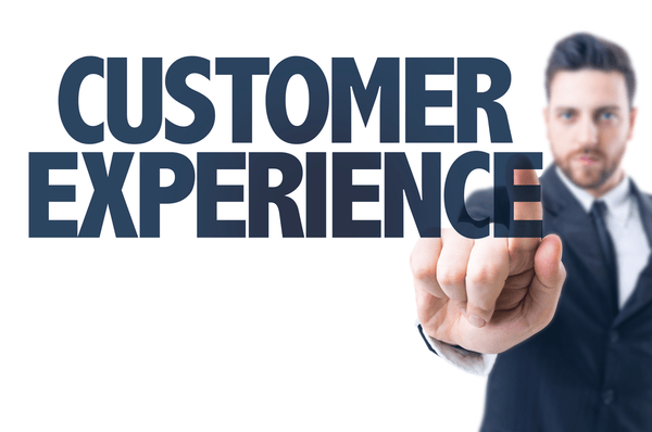 BusinessmanpointingthetextCustomerExperience