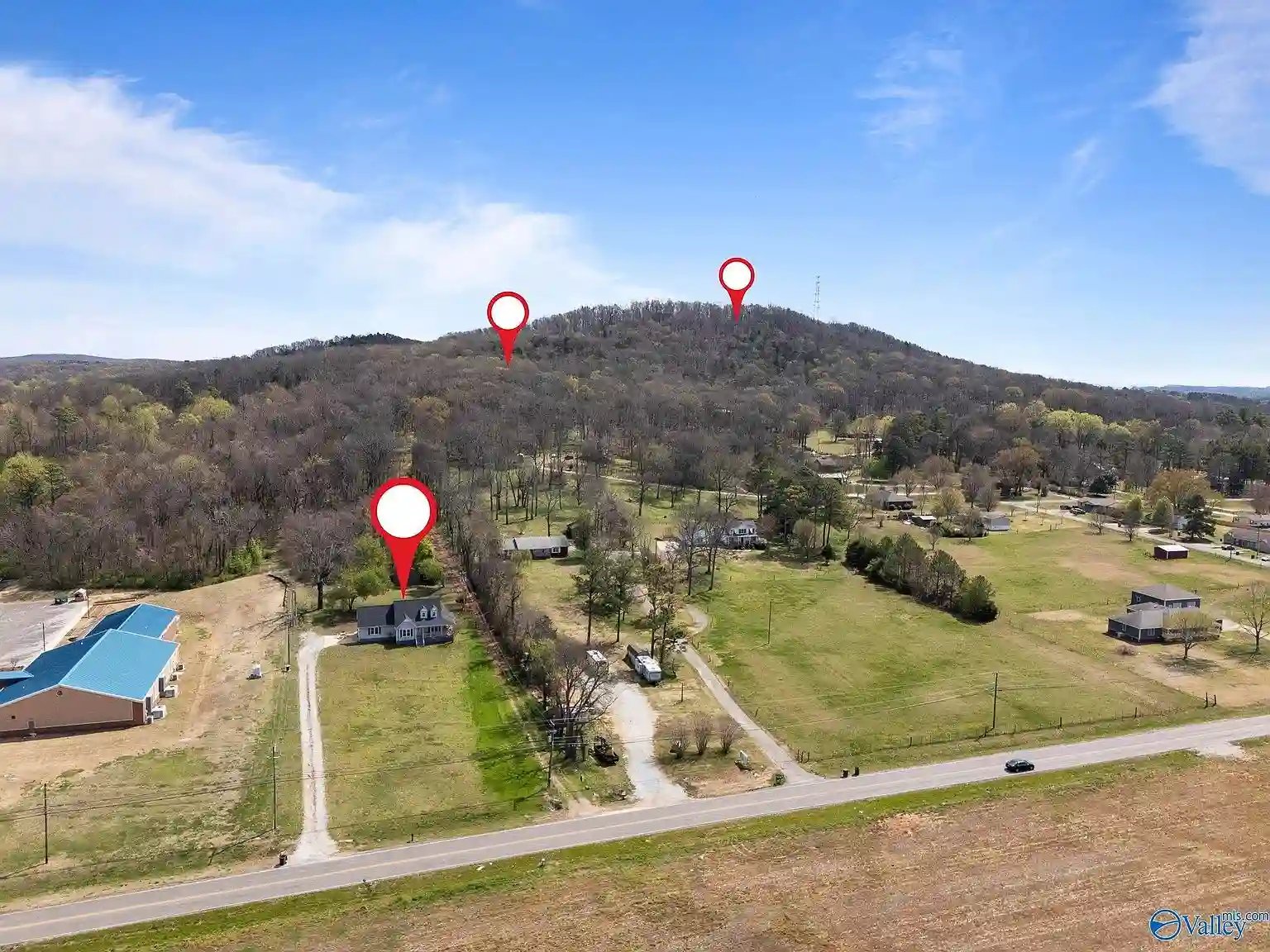 Commercial corridor on Wall Triana Highway in Harvest Alabama showing potential stormwater exposure