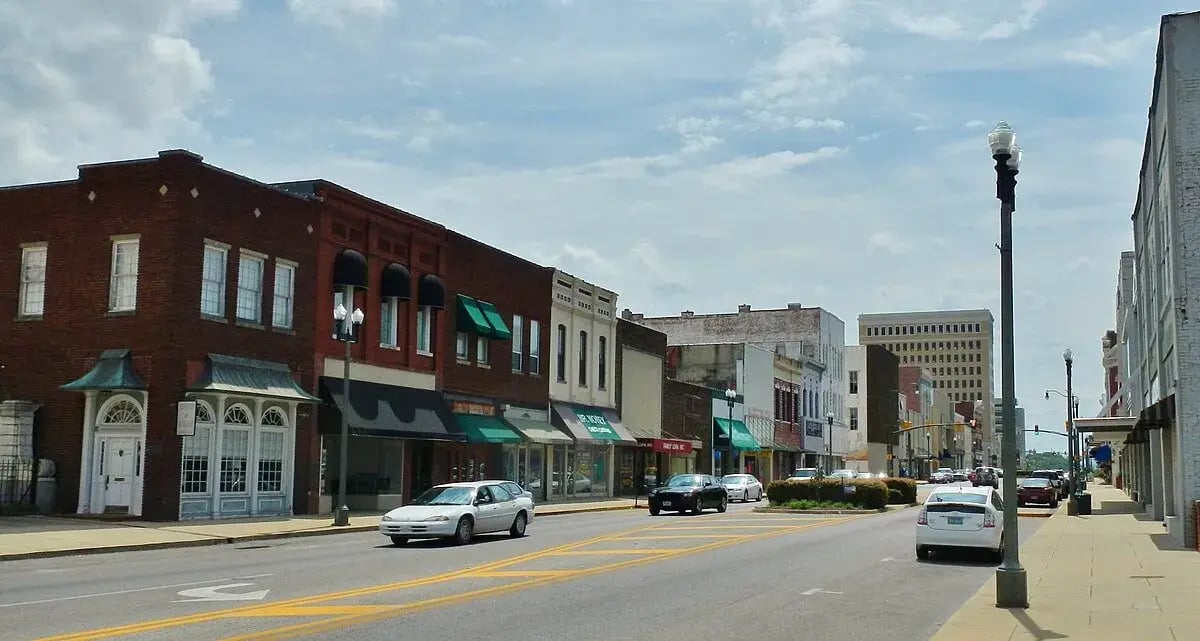 Downtown Anniston, Alabama skyline with historic buildings and Blue Mountain backdrop