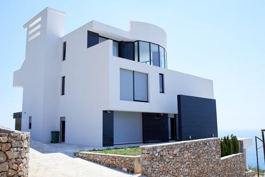 External view of a contemporary house modern villa at  sunset