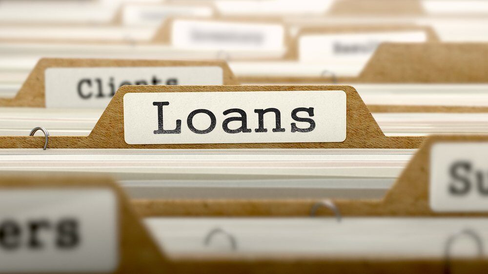 Loans Concept_ Word on Folder Register of Card Index_ Selective Focus_-1