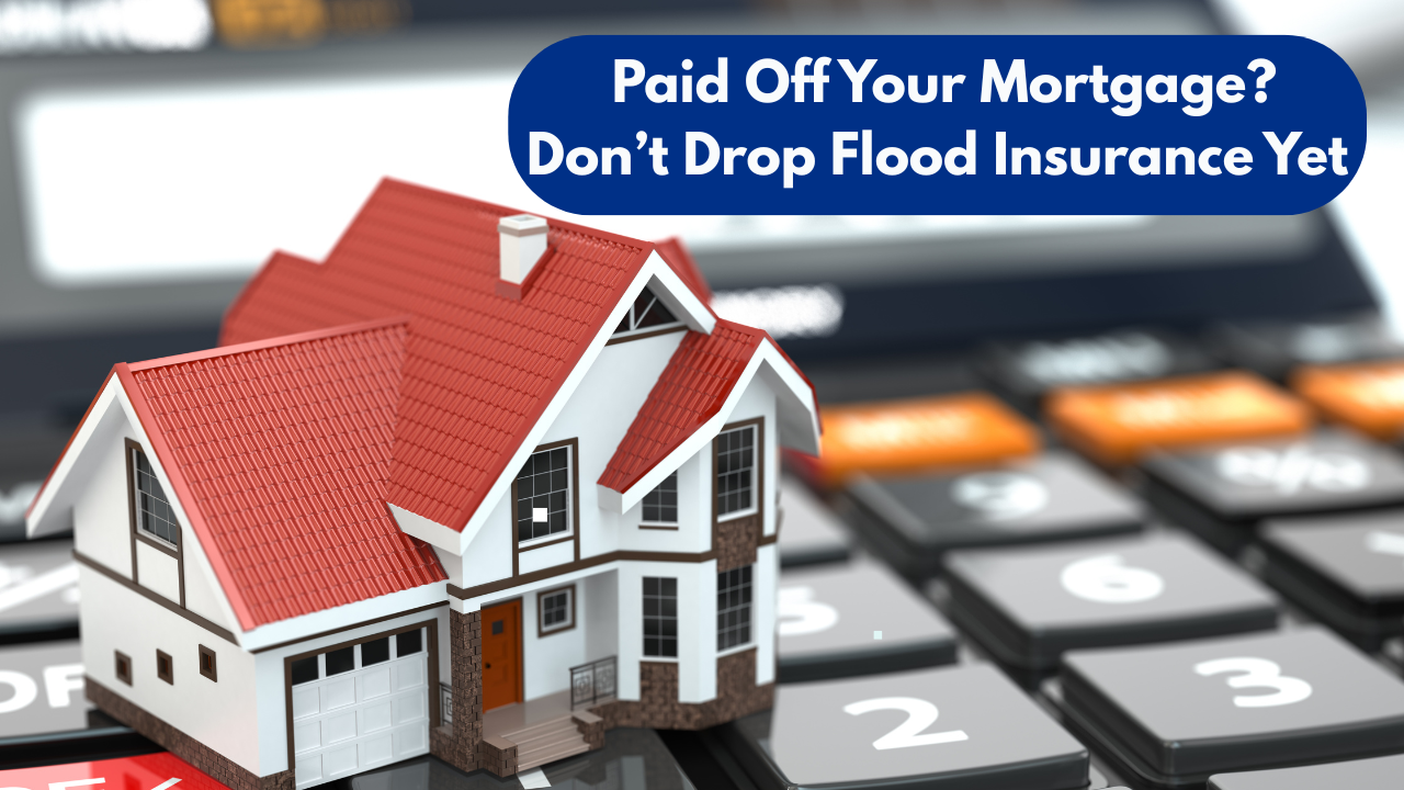Illustration of a house on a calculator with text reading Paid Off Your Mortgage? Don’t Drop Flood Insurance Yet