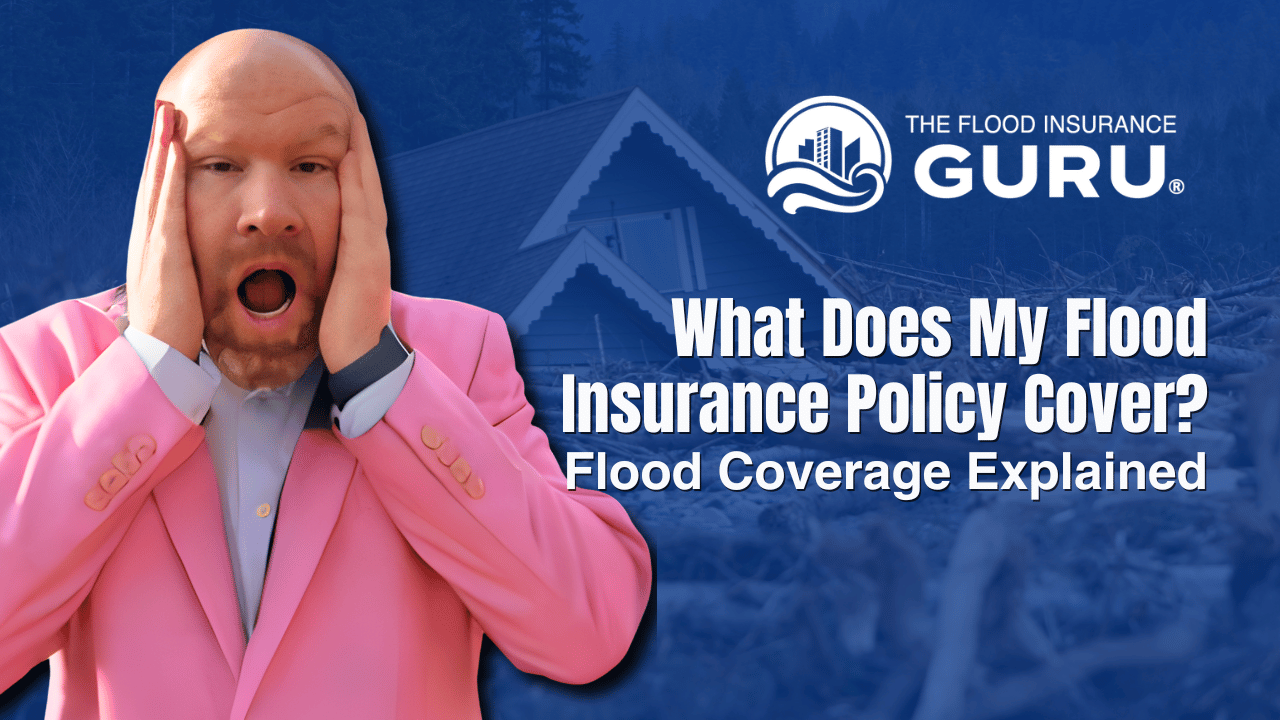 A rectangular banner with a blue-tinted background image of a flooded house and debris. On the left, a man in a bright pink suit and white shirt holds his face in shock with his mouth open. On the right, the logo “The Flood Insurance Guru” (a stylized building with waves) appears above large white text: “What Does My Flood Insurance Policy Cover?” and below that in smaller white text: “Flood Coverage Explained.”