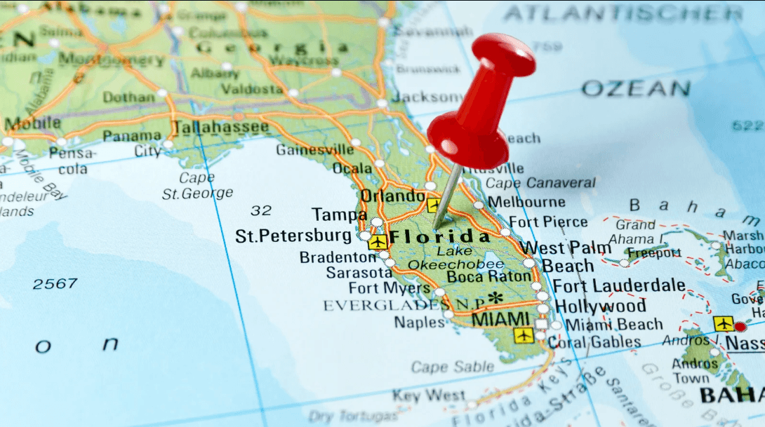 A map with a red pin on Florida