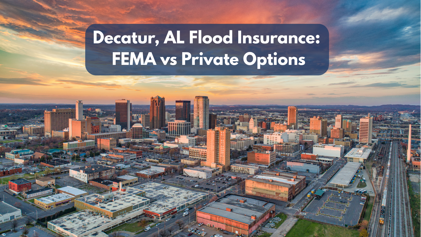Aerial view of downtown Decatur, Alabama at sunset with vibrant skies and city buildings, overlaid with the title “Decatur, AL Flood Insurance: FEMA vs Private Options.”